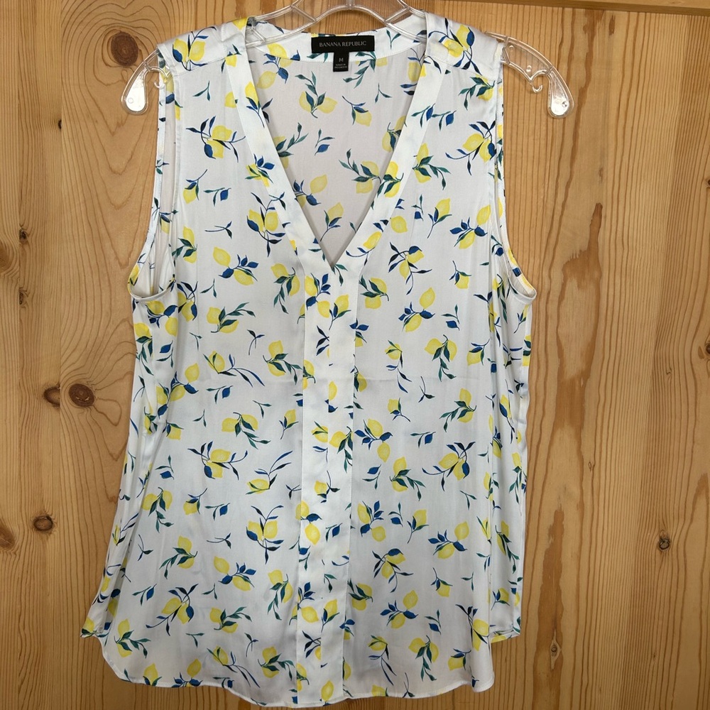 If life gives you lemons, make lemonade! A springy, fresh and fun v neck Blouse.